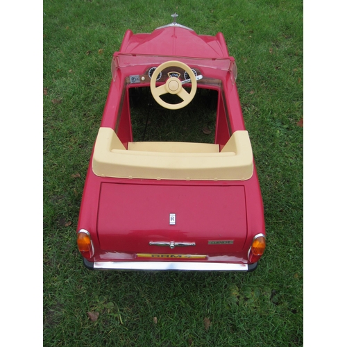 9140 - A 1980s Sharna for Triang Rolls Royce Corniche pedal car with electric motor, red moulded plastic bo... 