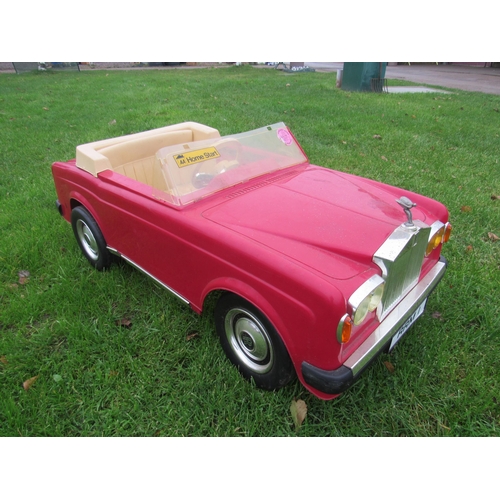 9141 - A 1980s Sharna for Triang Rolls Royce Corniche pedal car with electric motor, red moulded plastic bo... 