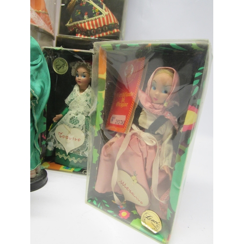 9330 - A collection of boxed and loose tourist and costume dolls including Lenci, together with a smaller n... 