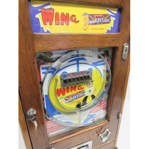 9157 - A 1950s Oliver Whales of Redcar oak cased 'Win A Navy Butterscotch' Allwin penny slot arcade pinball... 