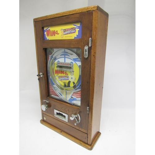 9157 - A 1950s Oliver Whales of Redcar oak cased 'Win A Navy Butterscotch' Allwin penny slot arcade pinball... 