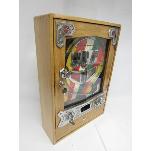 9160 - A 1950s Bryans 'Three Ball Forks' penny slot arcade pinball machine with multi-coloured sunburst pan... 