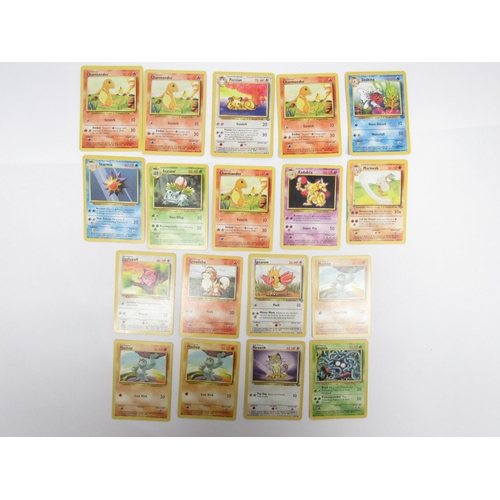 9049 - A collection of vintage Pokémon TCG cards, comprising fifty-two character cards, nineteen energy car... 