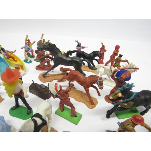 9165 - A collection of playworn Timpo, Britains and other plastic figures and accessories, predominantly co... 