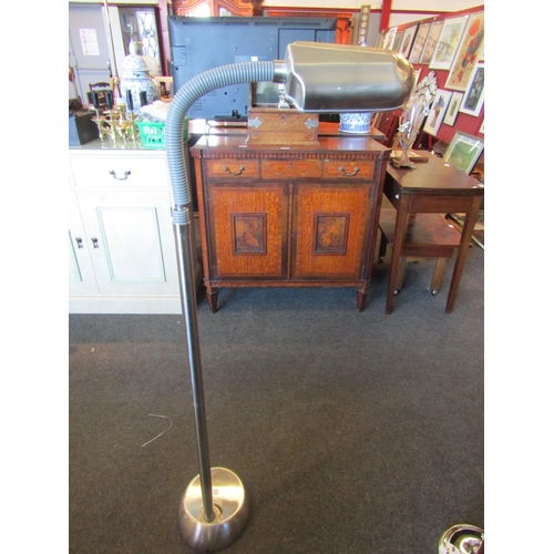 1023 - A vintage style reading lamp, 160cm tall fully extended