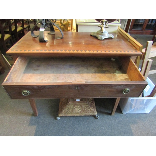 1116 - An Edwardian mahogany dressing table, the geometric inlaid top over a single long drawer and two sho... 