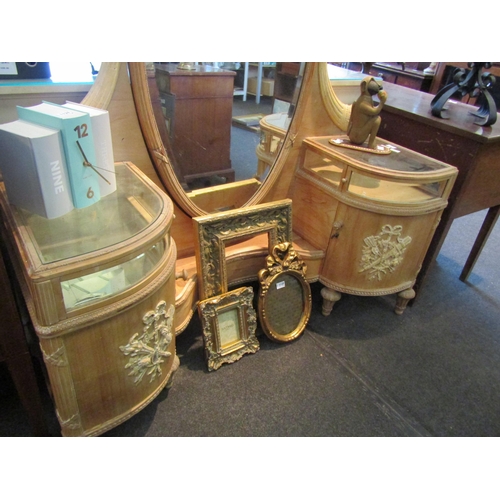 1119 - A 19th Century French dressing table, central oval swivel mirror, flanked by twin display-top cabine... 