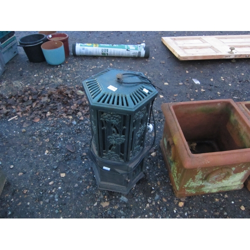 3396 - A greenhouse cast iron heater.  DTI Failure: Please see information pages