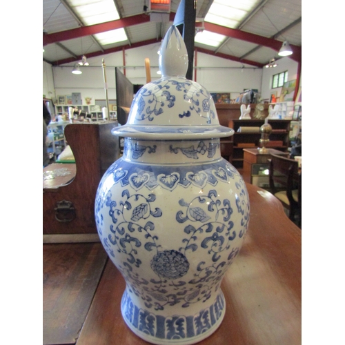 1122 - A pair of blue and white Chinese style lidded ginger jars, 47cm tall