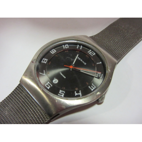 1381 - A gents Bering titanium wristwatch with case instructions and guarantee