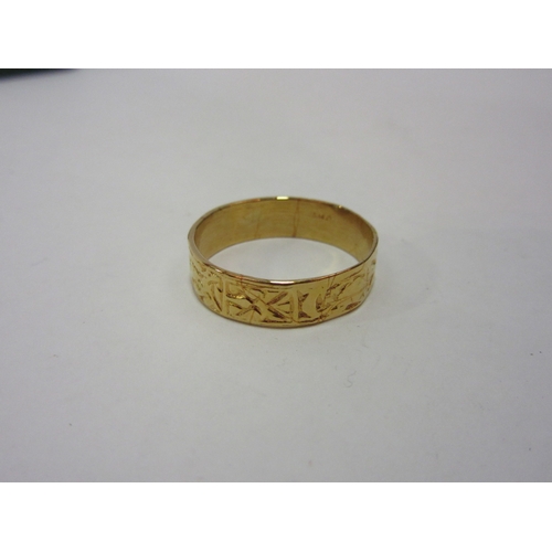 1388 - A ring, possibly gold, and an 18ct gold tie pin etc.