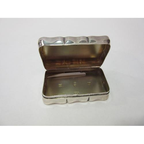 1412 - An A. Chick & Sons Ltd. silver snuff / trinket box, scrolled foliate engraved and with vacant cartou... 