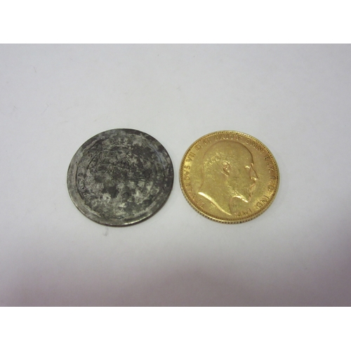 1415 - A 1908 gold full sovereign and another silver coin