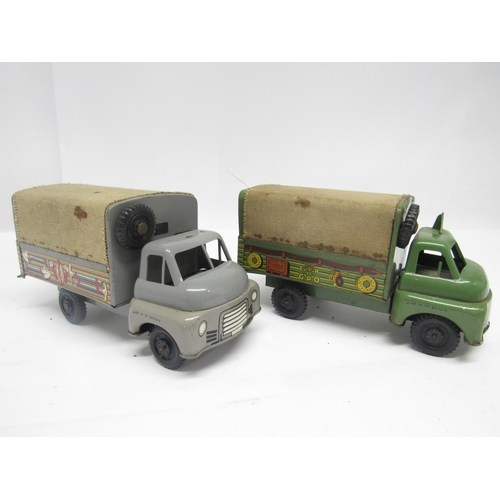 9193 - Two playworn Wells Brimtoy tinplate and plastic friction drive trucks to include GPO repairs service... 