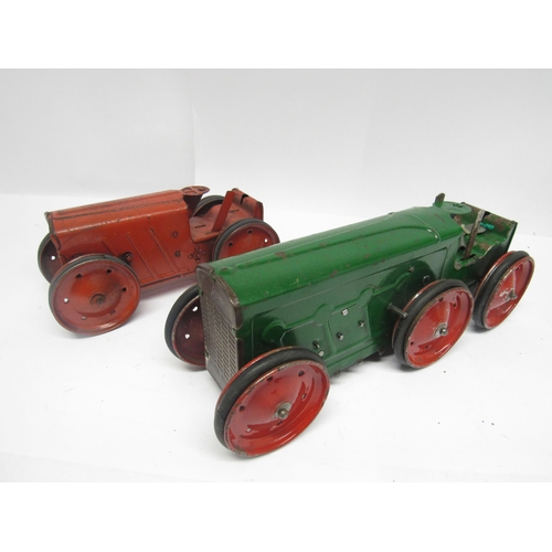 9181 - Two playworn 1930's Triang clockwork tractors, comprising No.2 in red with fixed key mechanism, 21cm... 