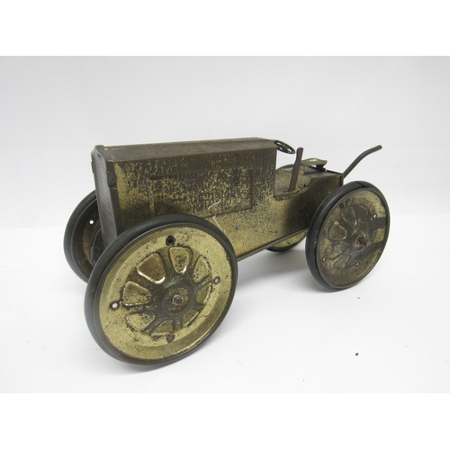 9194 - A playworn early 20th Century Animate Toys (USA) clockwork tinplate tractor, 22cm long