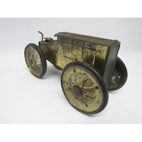 9194 - A playworn early 20th Century Animate Toys (USA) clockwork tinplate tractor, 22cm long