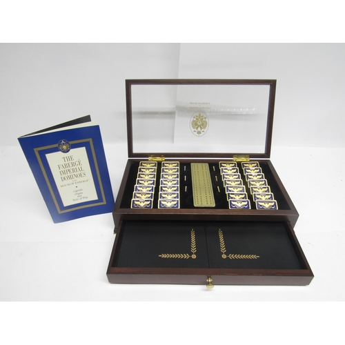 9055 - A House of Faberge Imperial Dominoes set, comprising twenty-eight 22ct gold plated and blue guilloch... 