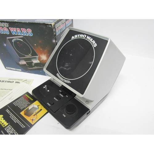 9007 - A Grandstand Astro Wars handheld electronic game, boxed with instructions