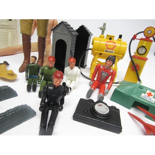 9215 - A collection of vintage playworn action figures, accessories and spares including Denys Fisher Six M... 