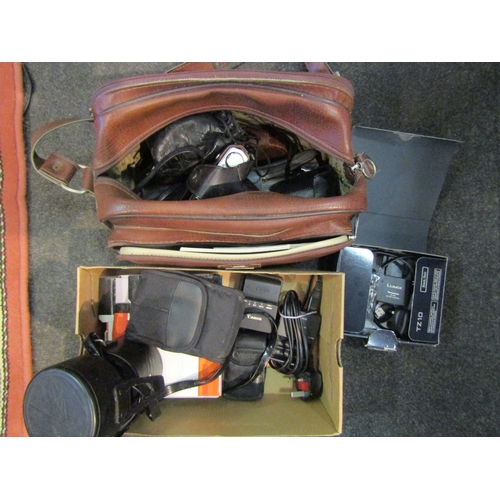 1638 - A box of digital cameras including Lumix, Pentax, vintage Olympus OM-1 with lenses and accessories