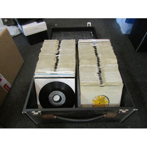 1645 - Three flight cases containing a quantity of 1970's and 80's vinyl record singles including Nik Kersh... 