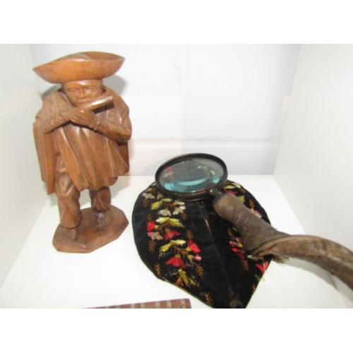 1456 - A carved wood figure of man playing the flute, two boxes, hat and horn handledmagnifying glass (5)