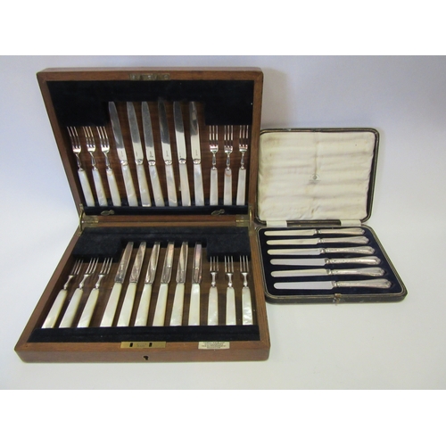 1448 - A quantity of cased cutlery sets including mother-of-pearl handled fruit set