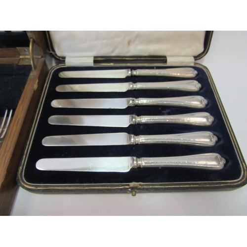 1448 - A quantity of cased cutlery sets including mother-of-pearl handled fruit set