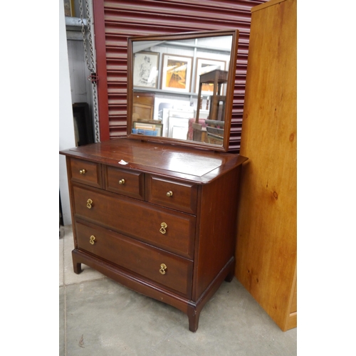 2446 - A Stag Minstrel mahogany dressing chest with mirror