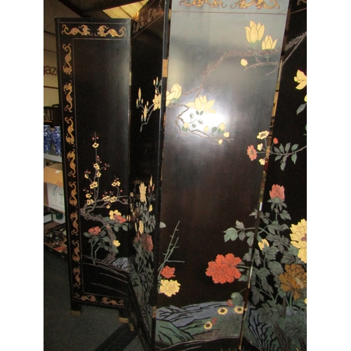 1162 - A lacquered six-fold Oriental screen, apple blossom, birds and flowers. 183cm tall