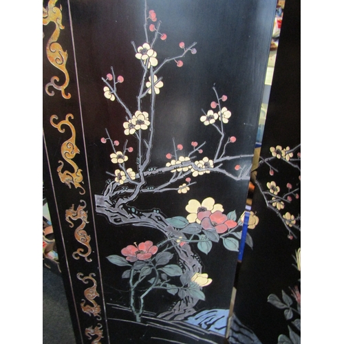 1162 - A lacquered six-fold Oriental screen, apple blossom, birds and flowers. 183cm tall