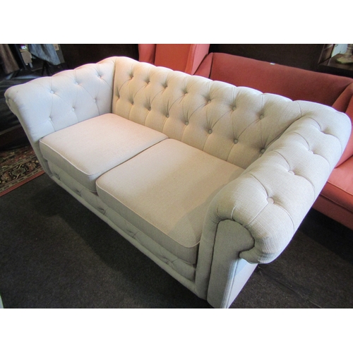 1192 - A modern Chesterfield two seater sofa