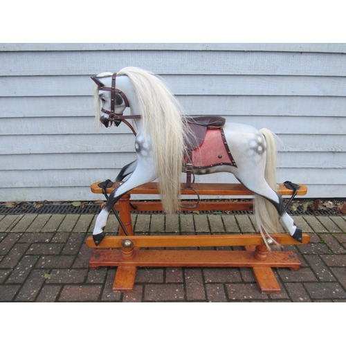 9207 - A Lines Brothers 'Triangtois' painted wooden rocking horse, circa 1925. on trestle rocker, horse hai... 