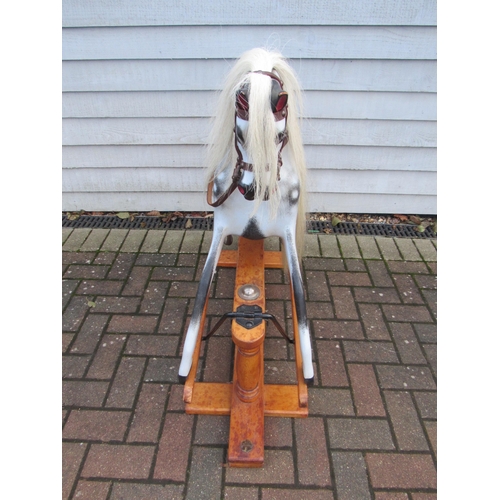 9207 - A Lines Brothers 'Triangtois' painted wooden rocking horse, circa 1925. on trestle rocker, horse hai... 