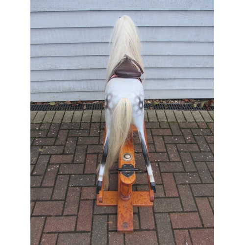 9207 - A Lines Brothers 'Triangtois' painted wooden rocking horse, circa 1925. on trestle rocker, horse hai... 