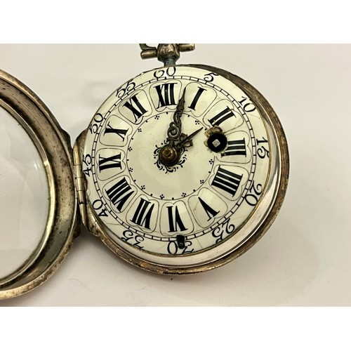 5171 - DELISLE OF PARIS: An early 18th Century silver cased double hinge French pocket watch, enamelled Rom... 