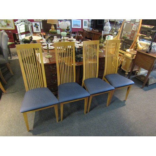 1171 - In the manner of Oak Furnitureland a set of eight natural oak high back dining chairs with chamfered... 