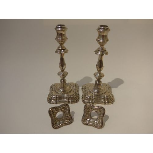 8004 - A pair of Edwardian Fordham & Faulkner silver candlesticks with knop stem to stepped square base wit... 