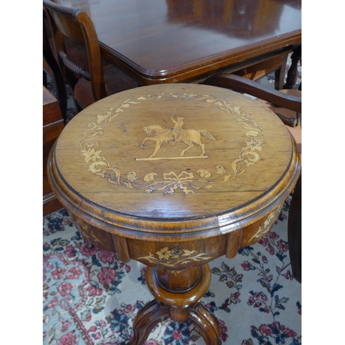 4008 - A Victorian rosewood sewing box table, marquetry inlaid lid with horse and rider design, over a shap... 