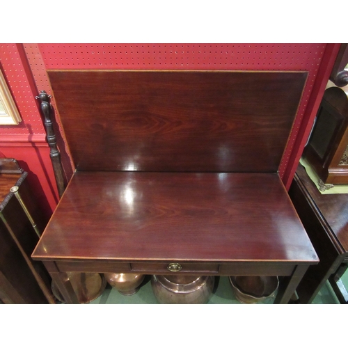 4139 - A George III flame mahogany side/tea table the hinged fold-over top and single frieze drawer on squa... 