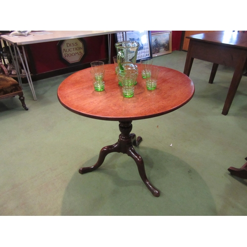 4144 - An early George III circa 1760 Cuban mahogany circular tilt-top wine table over a turned & wrythen c... 