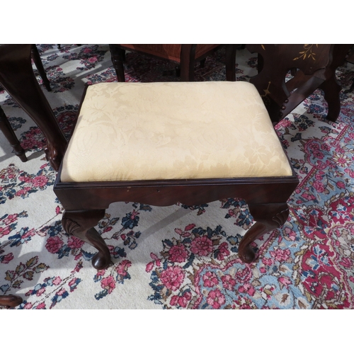 4091 - An early George III revival mahogany stool with shaped frieze over cabriole legs with shell carved d... 