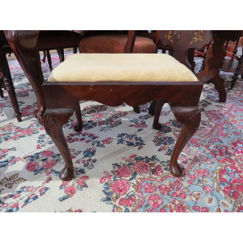 4091 - An early George III revival mahogany stool with shaped frieze over cabriole legs with shell carved d... 