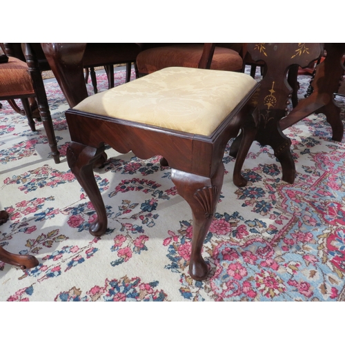 4091 - An early George III revival mahogany stool with shaped frieze over cabriole legs with shell carved d... 