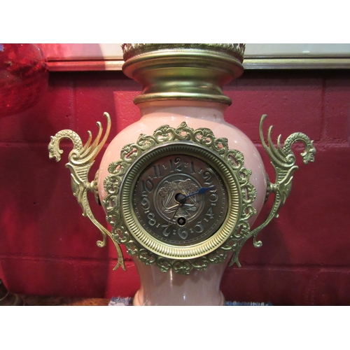 4204 - A late 19th Century mantel timepiece in the form of a rose pink porcelain vase made by DeWinter & Fi... 