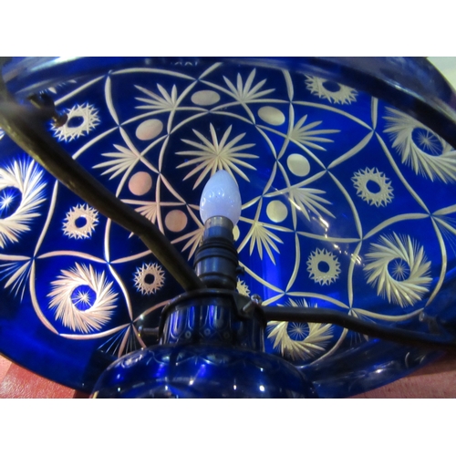 4227 - A Bohemian cobalt blue cut glass Liberty style table lamp, approximately 55cm tall