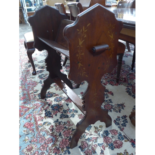 4241 - A floor standing book trough with shaped ends with gilt decoration, 81cm x 63cm x 35cm