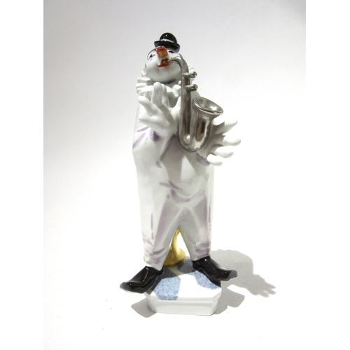 4500 - A Peter Strang (1936-2022) For Meissen 20th Century porcelain figure of a clown playing the saxophon... 