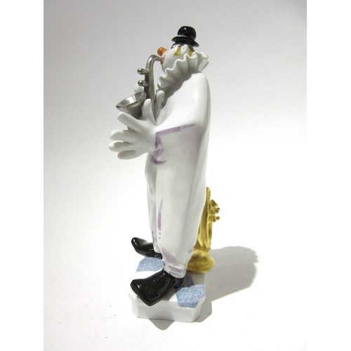 4500 - A Peter Strang (1936-2022) For Meissen 20th Century porcelain figure of a clown playing the saxophon... 